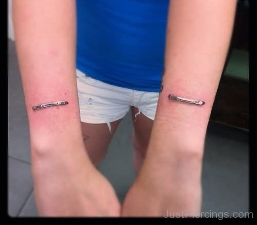 Staple Piercing On Both Arms