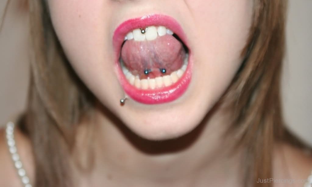 Frowny And Tongue Mouth Piercing