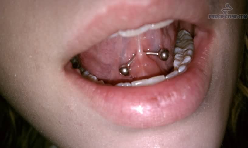 Girl Showing Her Tongue Web Mouth Piercing