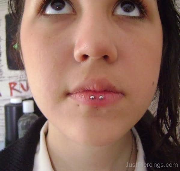 Horizontal Lip Piercing With Small Studs