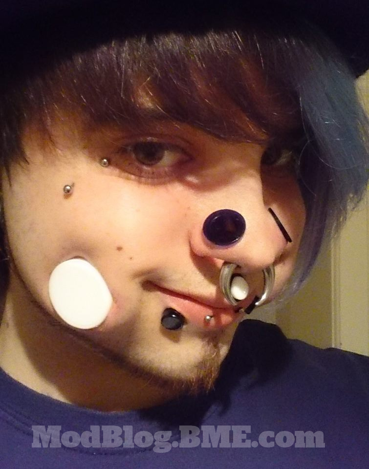 Nose Stretching And Cheek Stretching Piercing For Guys