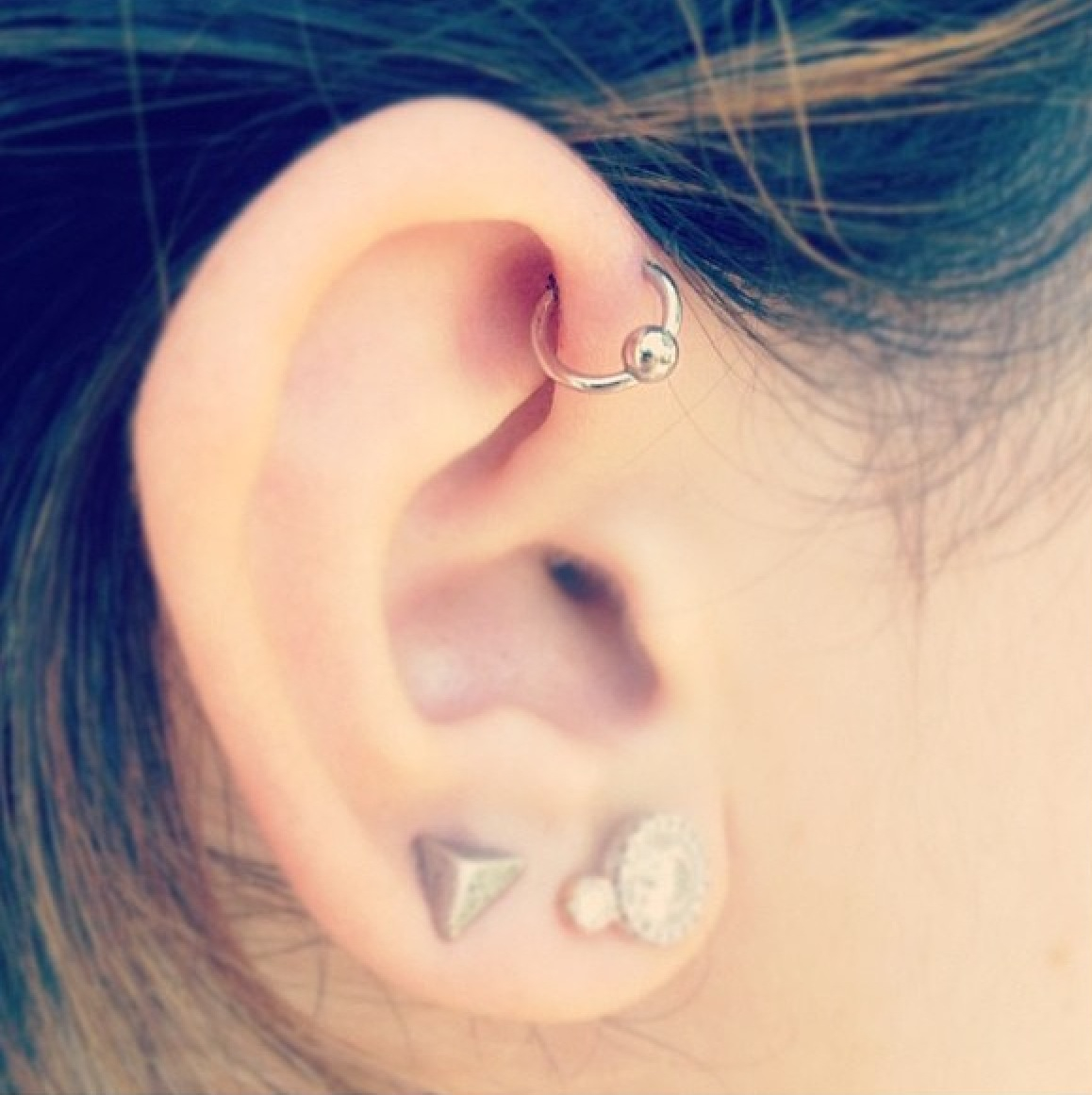 Right Ear Dual Lobe And UFO Piercing