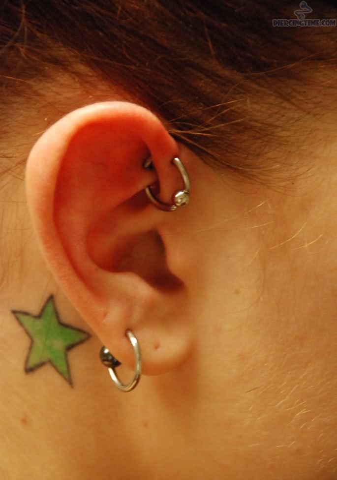 Right Ear Lobe And UFO Piercing With Silver Bead Ring