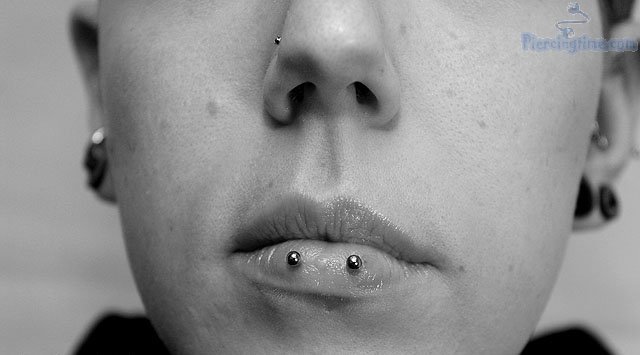 Right Nostril And Horizontal Lip Piercing