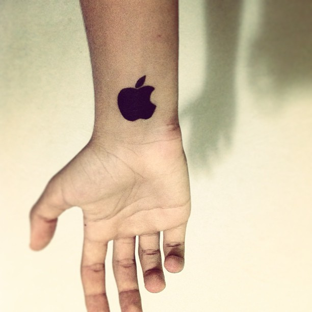 Apple Logo Silhouette Tattoo On Wrist