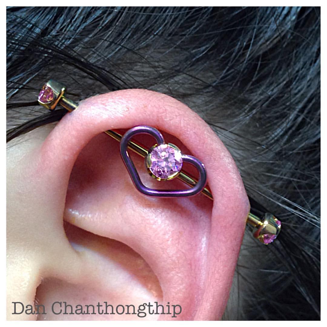 Beautiful Custom Industrial Piercing With Heart Barbell