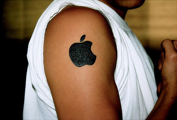 Black IPhone Apple Logo Silhouette Tattoo On Right Shoulder