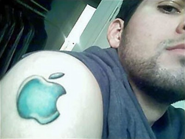 Blue Apple Logo Tattoo On Shoulder