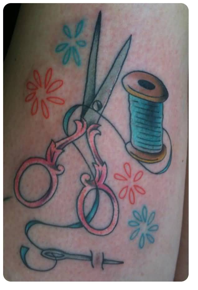 Blue Spool With Scissor And Needle Tattoo