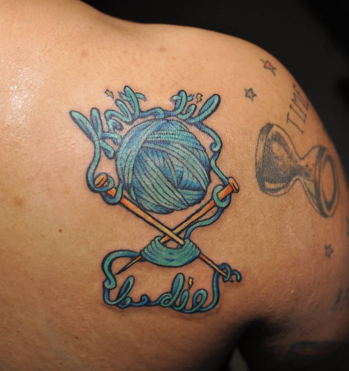 Blue Yarn Knitting Tattoo On Right Back Shoulder