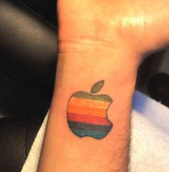 Colorful Apple Logo Tattoo On Wrist