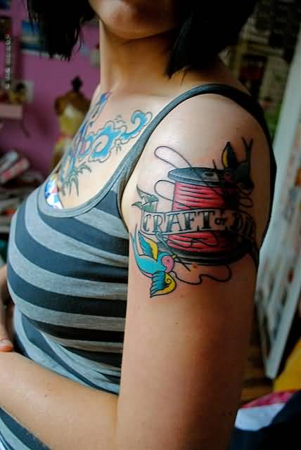 Craft Spool With Birds Tattoo On Left Shoulder