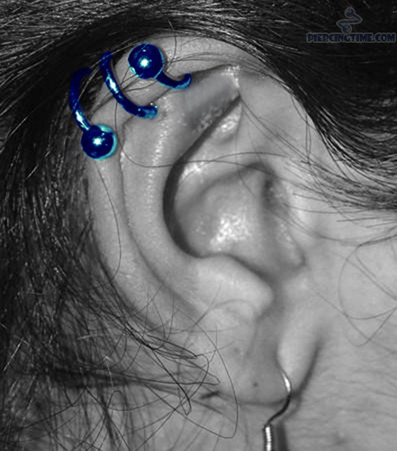 Custom Industrial Piercing With Blue Spiral Barbell