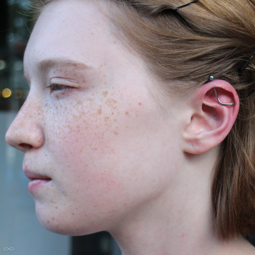 Custom Industrial Piercing With Curved Silver Barbell