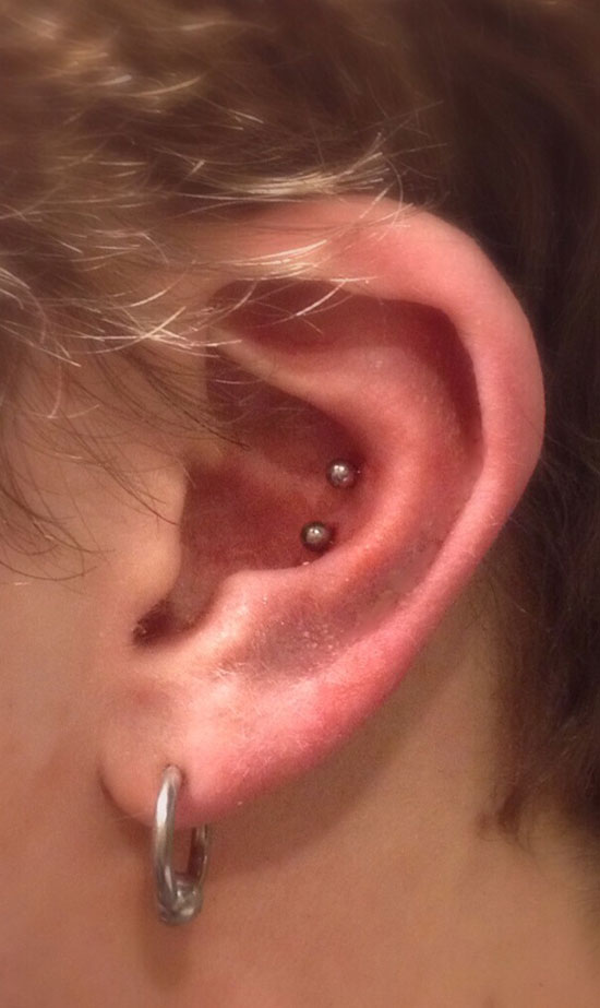 Double Conch Piercing With Silver Studs