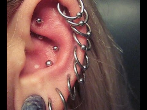 Dual Conch Piercing With Silver Bead Rings