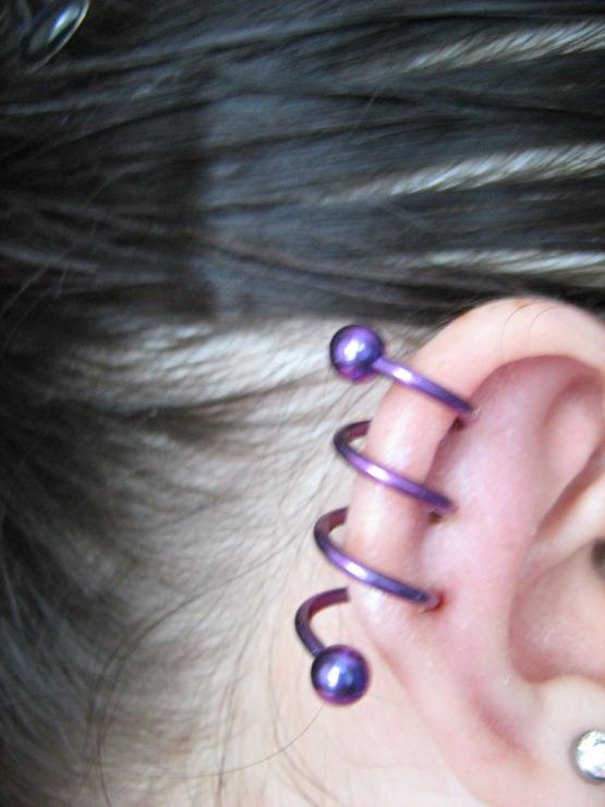 Ear Spiral Piercing With Purple Ring