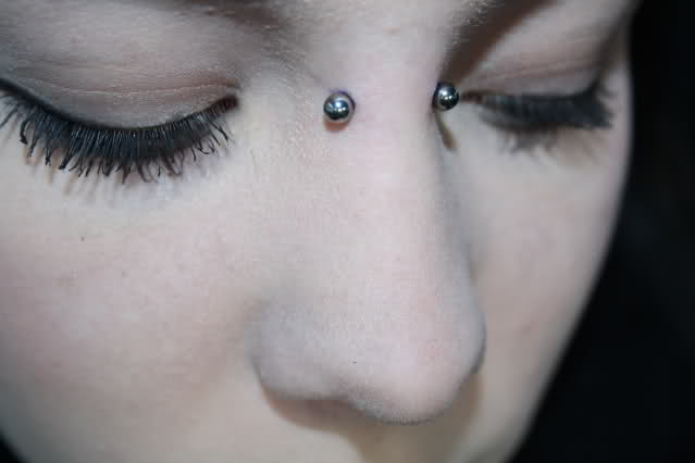 Earl Piercing With Blue Barbell