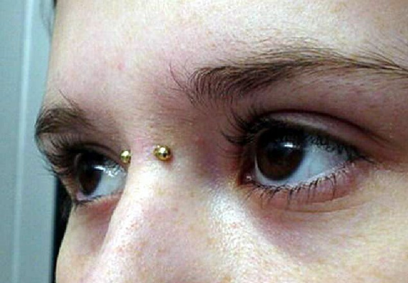 Earl Piercing With Gold Barbell For Girls