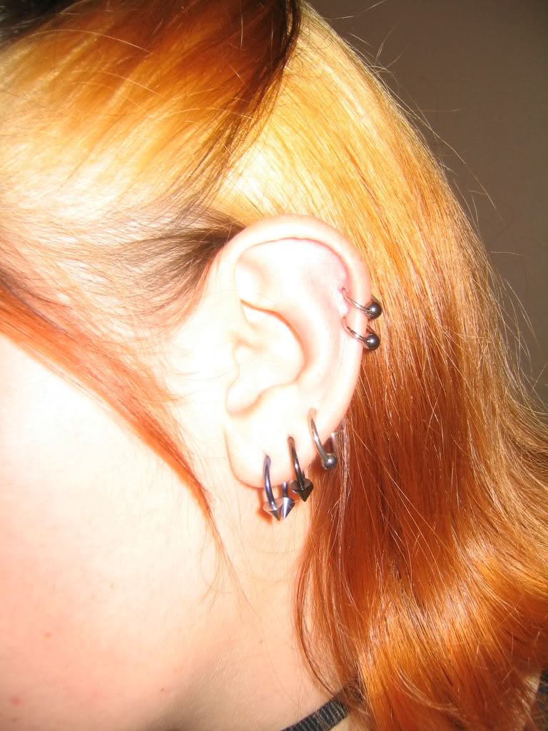 Girl Left Ear Spiral Piercing Picture