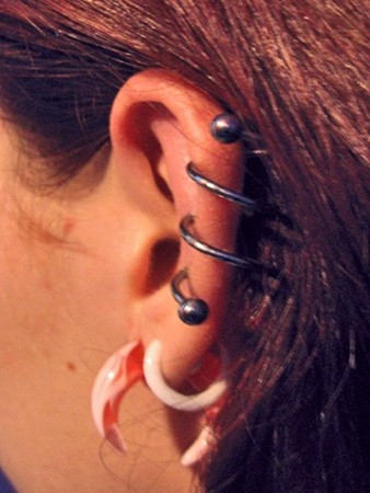 Read Complete Girl With Ear Spiral Piercing On Left Ear