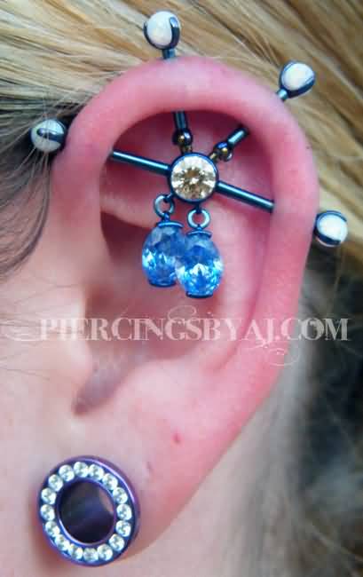 Left Ear Lobe And Custom Industrial Piercing On Left Ear