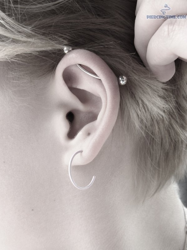 Left Ear Lobe And  Custom Industrial Piercing With Curved Barbell