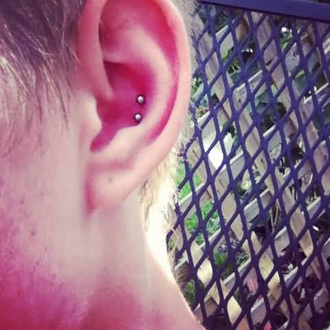 Nice Dual Conch Piercing On Left Ear