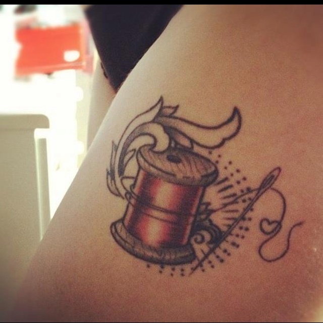 Nice Needle And Spool Tattoo