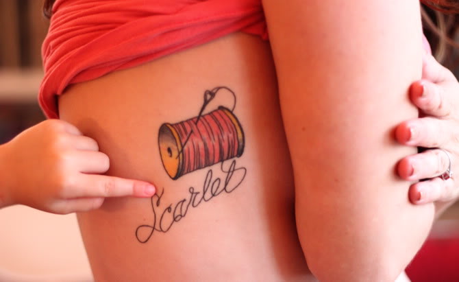 Nice Scarlet Spool Tattoo On Side Rib For Girls