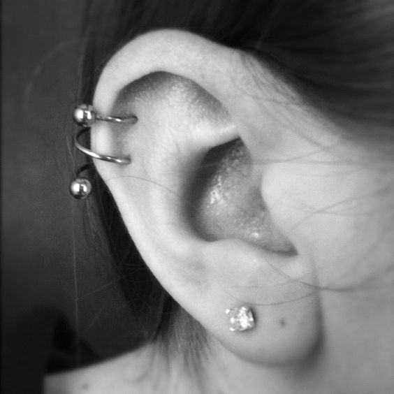 Right Ear Lobe And Spiral Piercing