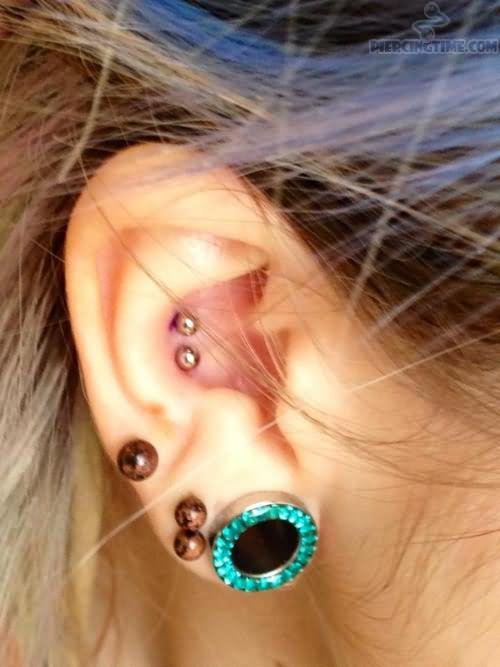 Right Ear Lobes And Dual Conch Piercing