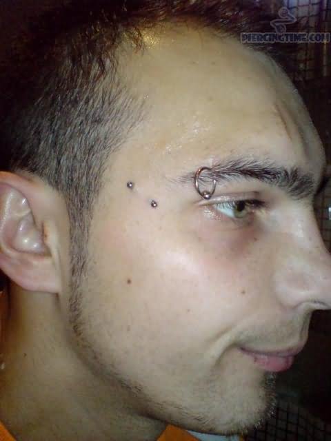 Right Eyebrow And Crow Feet Piercing For Men