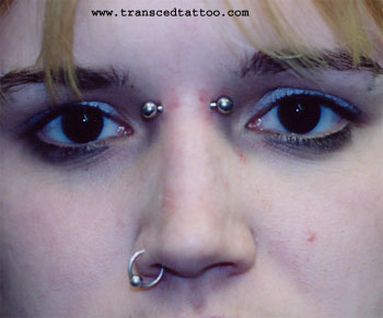 Right Nostril And Earl Piercing