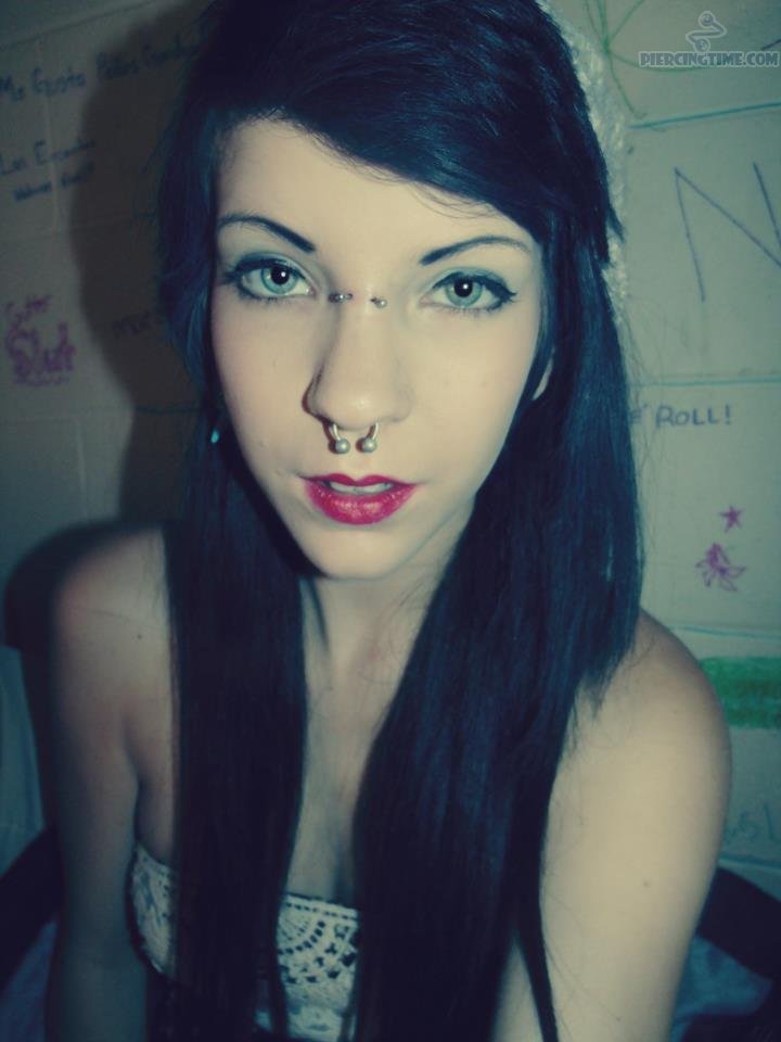 Septum Piercing With Circular Barbell And Earl Piercing