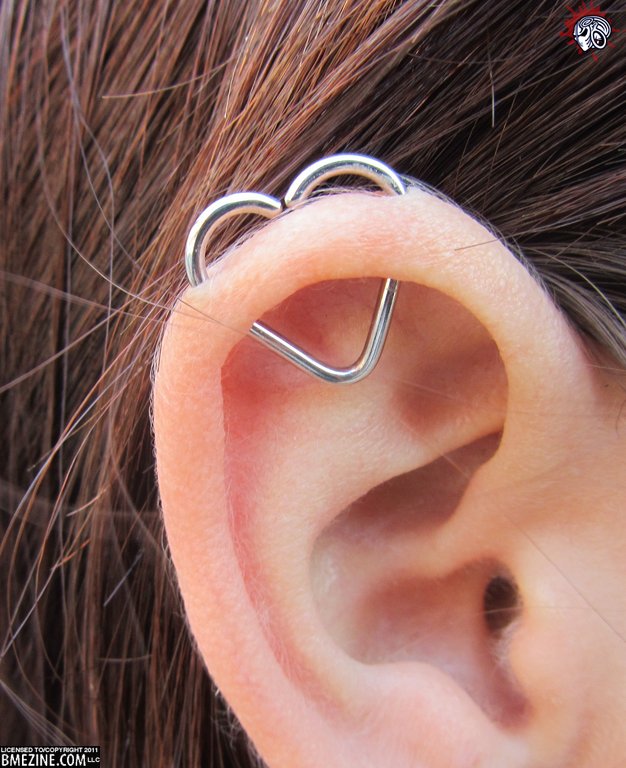 Silver Heart Ring Piercing On Girl Right Ear