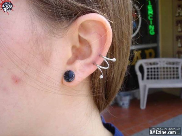 Single Lobe And Spiral Ear Piercing