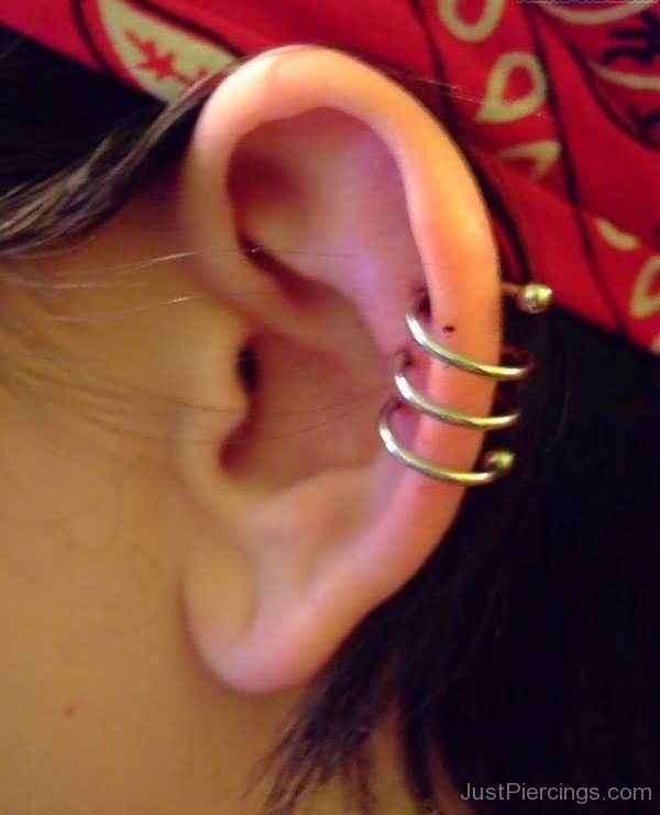 Spiral Ear Piercing With Silver Spiral Ring