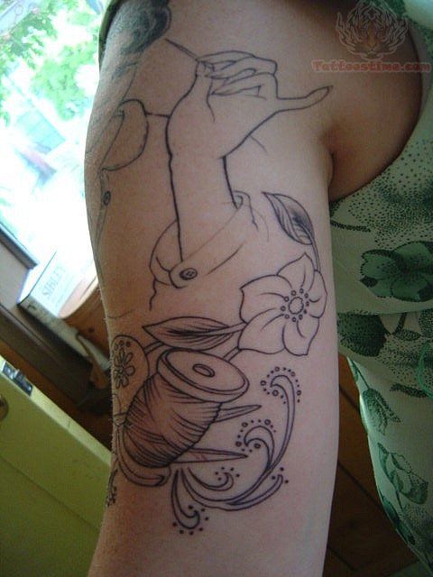 Spool And Flowers With Man Tattoo On Right Half Sleeve