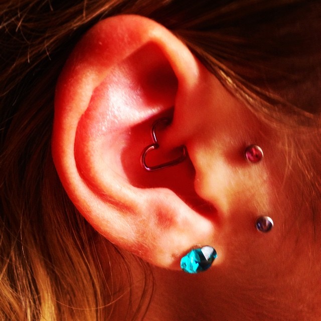 Surface Tragus And Ear Heart Piercing