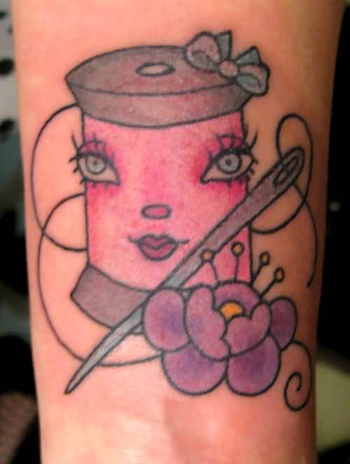 Traditional Female Spool Tattoo On Wrist