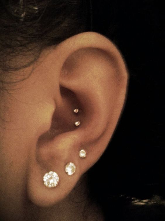 Triple Ear Lobe And Double Conch Piercing For Girls