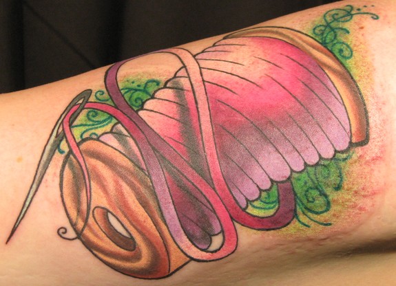 Wonderful Red Spool Tattoo