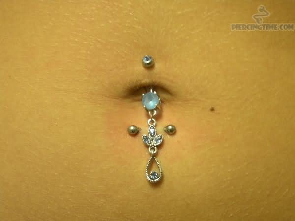 Amazing Horizontal Navel Piercing Closeup Image