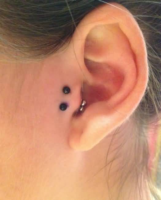 Black Barbells Surface Tragus Piercing