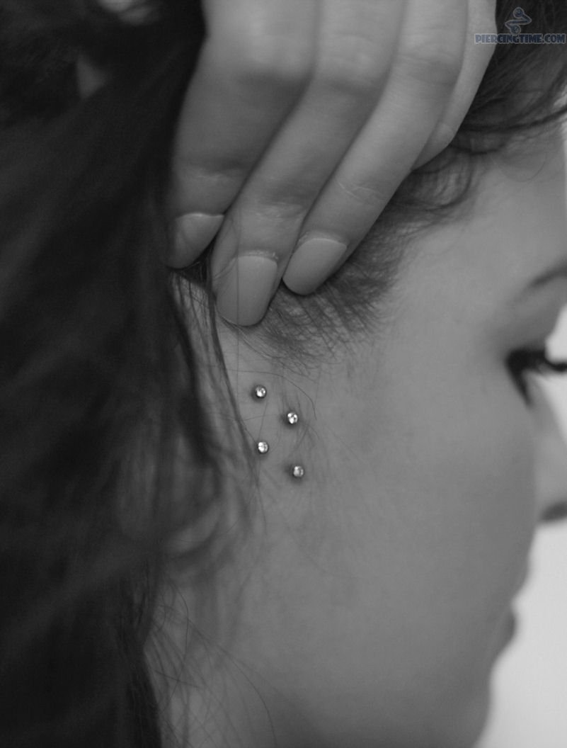 Double Surface Tragus Piercing With Silver Barbells