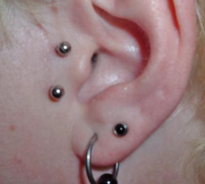 Dual Lobe And Surface Tragus Piercing