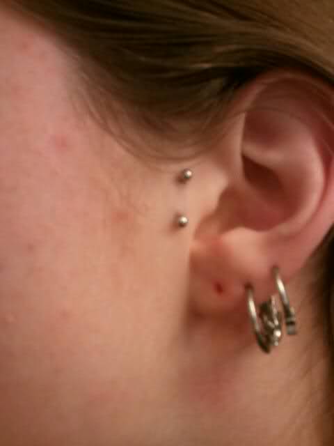 Dual Lobe Surface Tragus Piercing