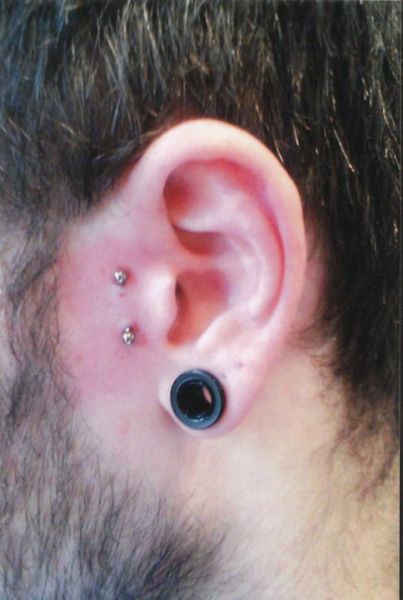 Gauge Lobe And Surface Tragus Piercing