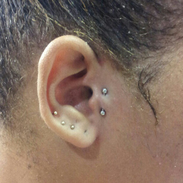 Girl Right Ear Surface Tragus Piercing Picture